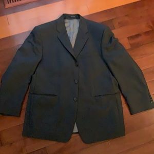 Calvin Klein mens suit.  Dark grey pinstripe. 100% wool.